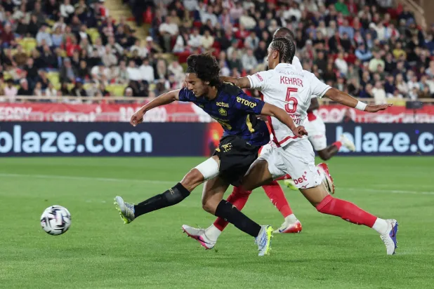 Football - Ligue 1 - AS Monaco v Lille - Stade Louis II, Monaco - May 10, 2026 Lille's Ayyoub Bouaddi in action with AS Monaco's Thilo Kehrer. (Reuters) 