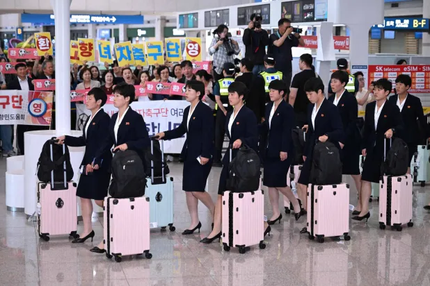 North Korea's Naegohyang Women's FC players arrive at Incheon International Airport in Incheon on May 17, 2026, ahead of the Women's Asian Champions League semi-final football match against South Korea's Suwon FC Women. (Photo by Jung Yeon-je / AFP)