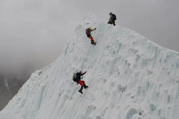Mountaineers participate in a training session at the Khumbu Icefall as they prepare for their ascent to the summit of Mount Everest, Nepal, Saturday, May 2, 2026. (AP Photo/Pasang Rinzee Sherpa)
