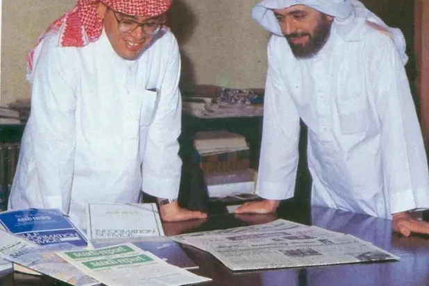 Publishers Hisham and Mohamed Ali Hafez look through publications. 