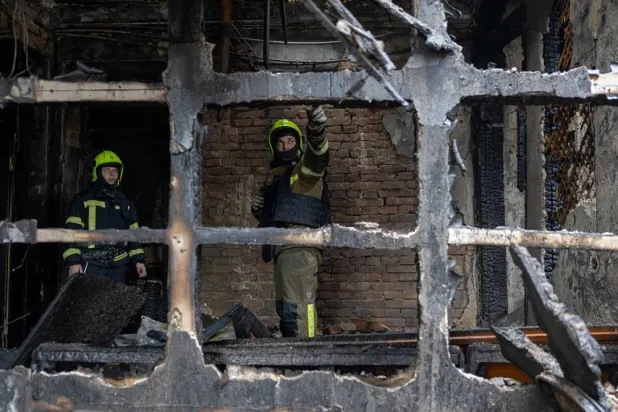 Ukrainian rescuers work at the site of an air attack in Odesa on May 18, 2026, amid the Russian invasion in Ukraine. (AFP)