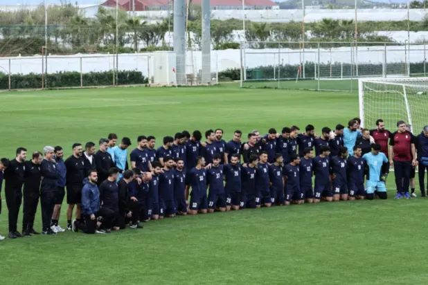 Iran's players and staff pose ahead of a training session in Antalya in March © Adem ALTAN / AFP/File
