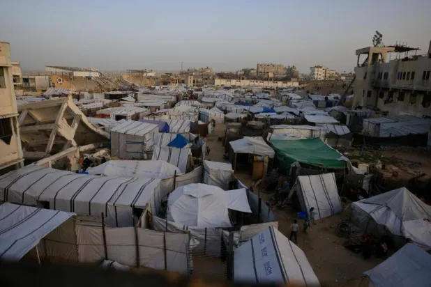Hundreds of thousands of people are still living in tents in the Gaza Strip, pictured in January, and conditions remain dire despite the ceasefire. Bashar Taleb / AFP/File
