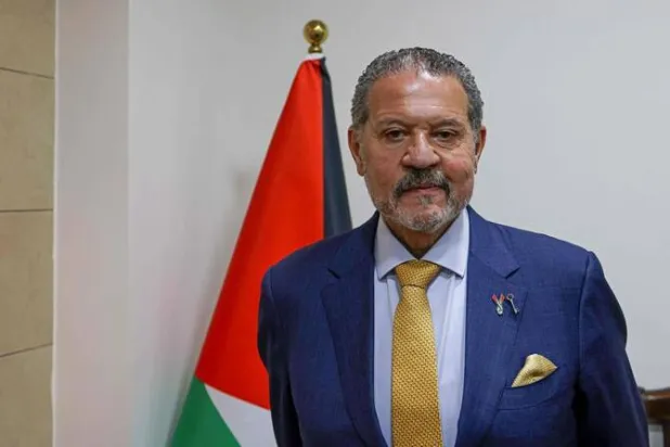 Yasser Abbas, newly-elected member of Fatah's central committee, poses for a picture at his office in Ramallah in the occupied West Bank on May 18, 2026. (AFP)
