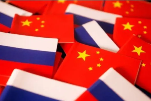 Flags of China and Russia are displayed in this illustration picture taken March 24, 2022. REUTERS/Florence Lo/Illustration Purchase Licensing Rights