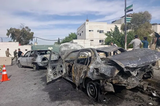  Syrian security personnel inspect the site of an explosion outside a Defense Ministry building in Damascus, Syria, Tuesday, May 19, 2026. (AP)