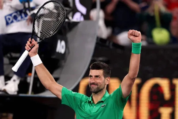 Serbia's Novak Djokovic celebrates victory over Spain’s Pedro Martinez during their men's singles match on day two of the Australian Open tennis tournament in Melbourne on January 19, 2026. (AFP)
