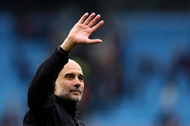 FILE PHOTO: Soccer Football - Premier League - Manchester City v Brentford - Etihad Stadium, Manchester, Britain - May 9, 2026 Manchester City manager Pep Guardiola celebrates after the match REUTERS/Chris Radburn/File Photo