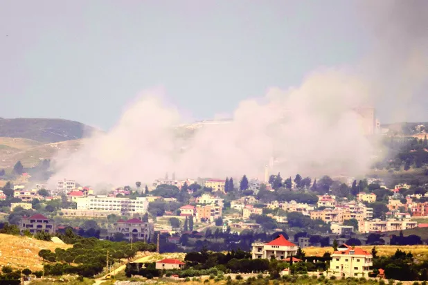 This picture taken on May 21, 2026 shows smoke rising from the site of an Israeli strike that targeted the southern Lebanese village of Mayfadoun. (Photo by AFP)
