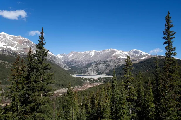 Small pockets of snow remain on the peaks of Colorado's Mosquito Range, towering over Montgomery Reservoir, near Alma, Colorado, on May 14, 2026. (Photo by Jason Connolly / AFP)