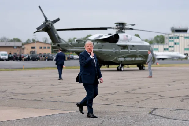 FILE PHOTO: US President Donald Trump leaves Marine One to board Air Force One en route to Joint Base Andrews, Maryland, as he departs Morristown Airport in Morristown, New Jersey, US, May 22, 2026. REUTERS/Kylie Cooper/File Photo
