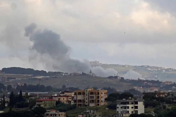 Smoke rises from the site of an Israeli strike that targeted the southern Lebanese village of Kfar Tibnit on May 21, 2026. (Photo by Abbas FAKIH / AFP)