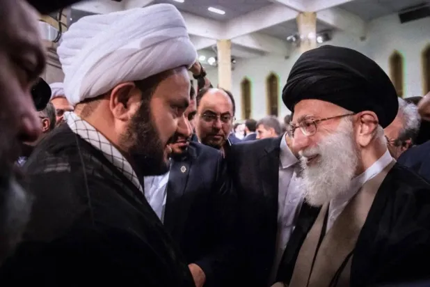 Slain Iranian Supreme Leader Ali Khamanei (R) and Nujaba Movement leader Akram al-Kaabi in Tehran in December 2018. (Supreme leader’s website) 