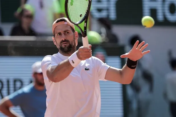 Novak Djokovic of Serbia during a training session on Philippe Chatrier court ahead of the French Open Grand Slam tennis tournament at Roland Garros in Paris, France, 23 May 2026. (EPA) 