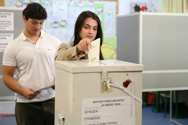 A woman casts her vote in the parliamentary elections at a polling station in Nicosia, Cyprus, 24 May 2026. EPA/George Christophorou
