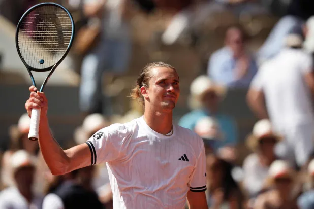 Germany's Alexander Zverev celebrates after winning his men's singles match against France's Benjamin Bonzi on day 1 of the French Open tennis tournament on Court Philippe-Chatrier at the Roland-Garros Complex in Paris on May 24, 2026. (AFP) 