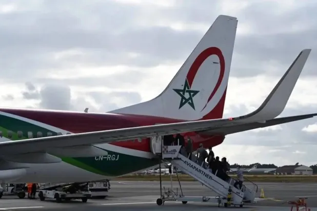  People board a Royal Air Maroc flight on July 15, 2020 at Bordeaux airport. (AFP) 