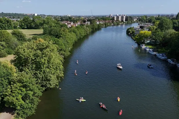 A drone view shows people using kayaks and paddle boards in the River Thames at Teddington Lock, London’s first official river bathing water site, as temperatures climb over the bank holiday weekend due to a heat dome spreading across the region, in London, Britain, May 24, 2026. (Reuters)