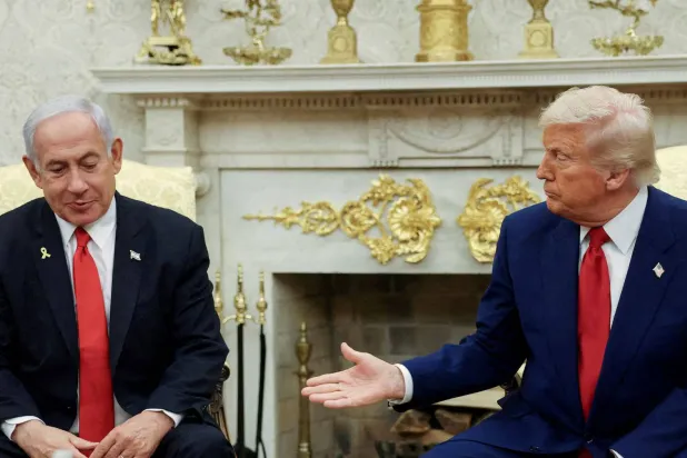 US President Donald Trump speaks alongside Israeli Prime Minister Benjamin Netanyahu during a meeting in the Oval Office of the White House in Washington DC, April 2025 (Reuters)