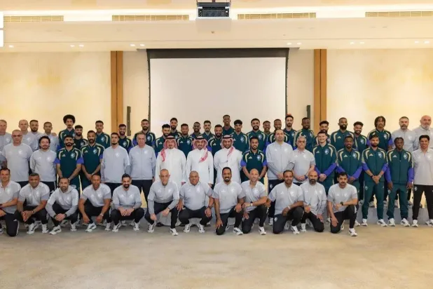Saudi Minister of Sport and President of the Saudi Olympic and Paralympic Committee Prince Abdulaziz bin Turki bin Faisal and the Saudi national team and accompanying staff sit for a family before the team's departure to the US. (SPA)