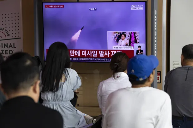 People watch the news on a television screen at a station in Seoul, South Korea, 26 May 2026. EPA/JEON HEON-KYUN