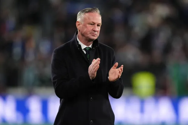 FILED - 26 March 2026, Italy, Bergamo: Northern Ireland manager Michael O'Neill applauds the fans after the 2026 FIFA World Cup European semi final qualifying soccer match between Italy and Northern Ireland at the New Balance Arena. Photo: Mike Egerton/PA Wire/dpa