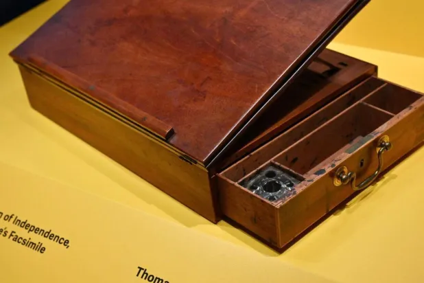 Thomas Jefferson's desk, on which he drafted the Declaration of Independence, can be seen on display by The Smithsonian for its 'American Aspirations' exhibition. Mandel NGAN / AFP
