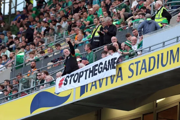 Football - International Friendly - Republic of Ireland v Qatar - Aviva Stadium, Dublin, Ireland - May 28, 2026 A banner is displayed in the stands as part of a protest during the match. (Reuters)