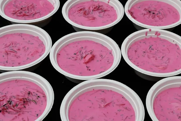 "Šaltibarščiai" beetroot soup is prepared during the Pink Soup Fest 2026, an annual event celebrating the in Vilnius, Lithuania, on May 30, 2026. (AFP)