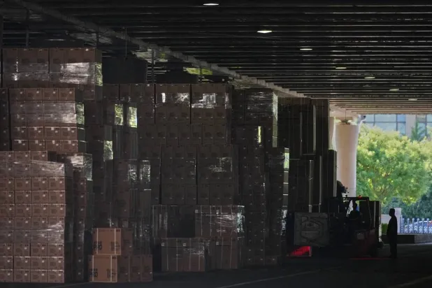  Worker use a forklift to transfer goods at the Xiaomi logistic center, in Beijing, China on Friday, May 29, 2026. (AP) 
