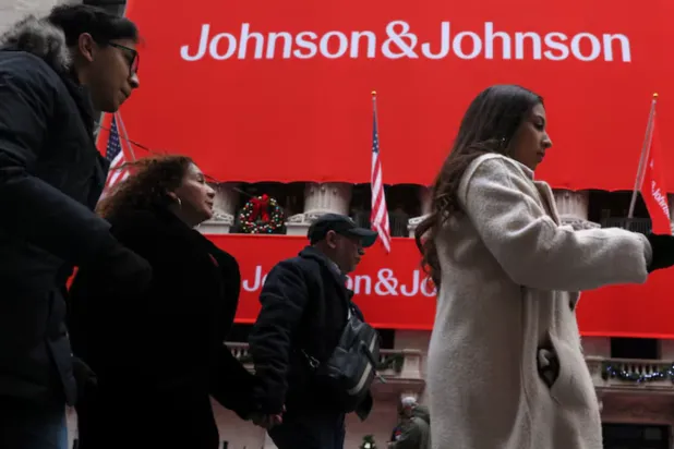 A Johnson & Johnson banner is displayed on the front of the New York Stock Exchange (NYSE) in New York City, in New York City, US, December 5, 2023. REUTERS/Brendan McDermid