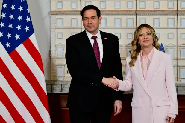 Italy's Prime Minister Giorgia Meloni welcomes US Secretary of State Marco Rubio at Palazzo Chigi in Rome on May 8, 2026. (AFP) 