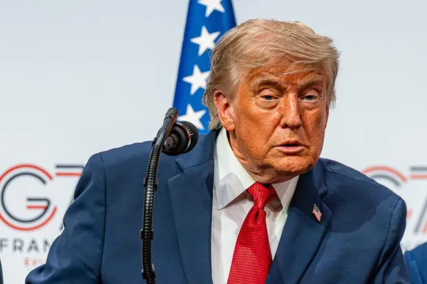 Trump ve diğer dünya liderleri geçen hafta Fransa'nın Evian-les-Bains komününde üç günlük uluslararası forum için bir araya geldi (AFP)