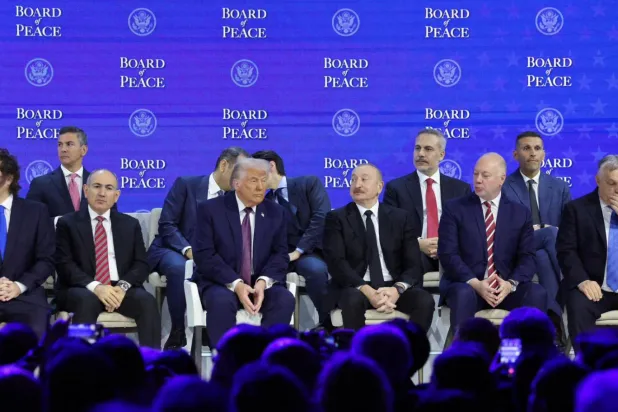 Dışişleri Bakanı Hakan Fidan, 22 Ocak'ta İsviçre'nin Davos şehrinde düzenlenen imza törenine Cumhurbaşkanı Recep Tayyip Erdoğan'ı temsilen katılarak Barış Kurulu Şartı'nı imzalamıştı (Dışişleri Bakanlığı)