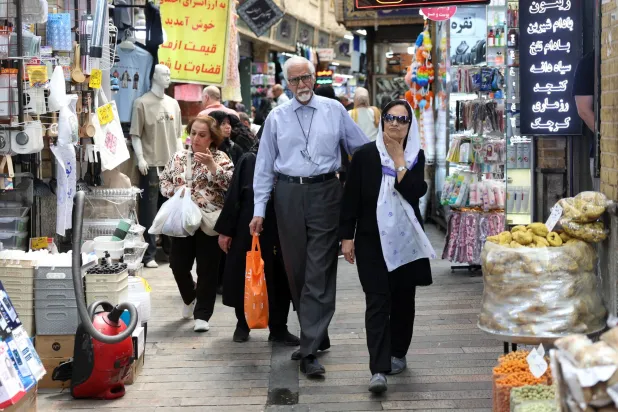 People shop in a bazaar in Tehran, Iran, 01 June 2026. EPA/ABEDIN TAHERKENAREH