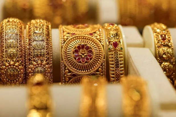 Gold bangles are displayed at a jewellery store in Mumbai, India, March 20, 2025. (Reuters)