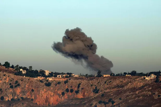 This photograph taken from the southern Lebanese area of Marjeyoun shows smoke rising from the site of an Israeli strike that targeted the village of Arnoun on June 3, 2026. (AFP)
