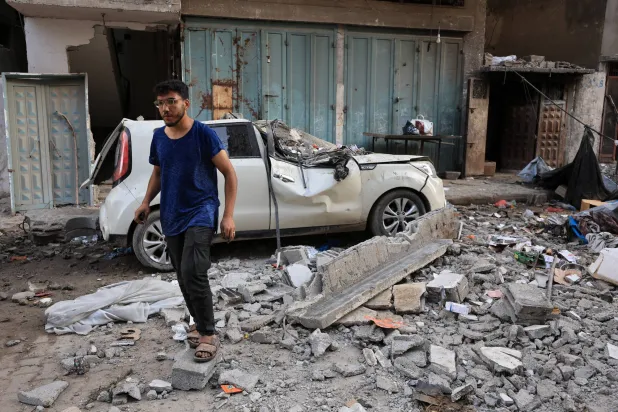 A Palestinian man stands at the site of an Israeli strike on an apartment in Gaza City, June 4, 2026. REUTERS/Dawoud Abu Alkas
