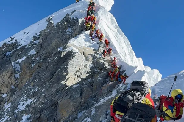 This photograph taken on May 20, 2026, shows mountaineers on Everest. Furte Sherpa / AFP
