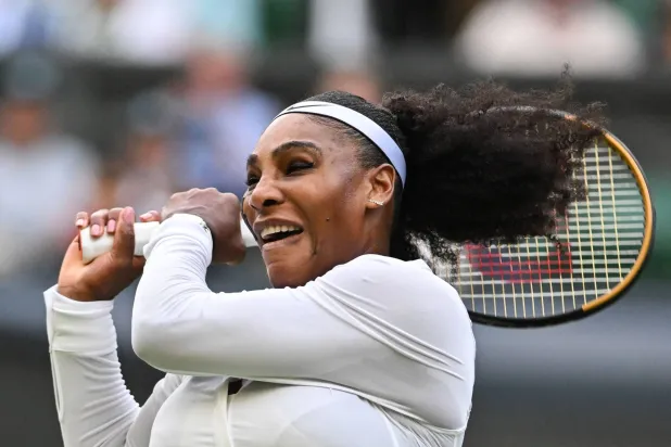 (FILES) US player Serena Williams returns the ball to France's Harmony Tan during their women's singles tennis match on the second day of the 2022 Wimbledon Championships at The All England Tennis Club in Wimbledon, southwest London, on June 28, 2022. (Photo by Glyn KIRK / AFP) 