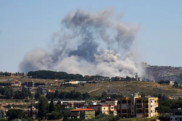 A photograph taken from the southern area of Nabatieh shows smoke rising from the site of an Israeli airstrike in the village of Kfar Tibnit on June 4, 2026. (Photo by Abbas Fakih / AFP)