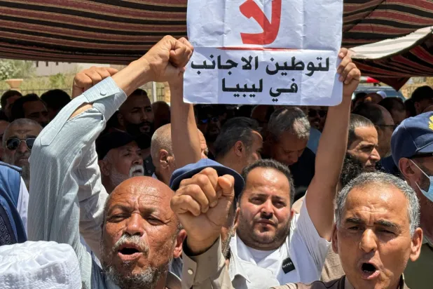 Protesters gather outside the headquarters of the United Nations High Commissioner for Refugees (UNHCR), in Tripoli, Libya, June 4, 2026. Picture taken with a mobile phone. REUTERS/Ayman al-Sahili