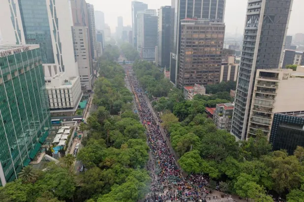 A drone view of people participating in an attempt to break the Guinness World Record for the world’s largest “Mexican wave” along Reforma Avenue as part of activities ahead of the FIFA World Cup 2026, in Mexico City, Mexico, June 6, 2026. (Reuters) 