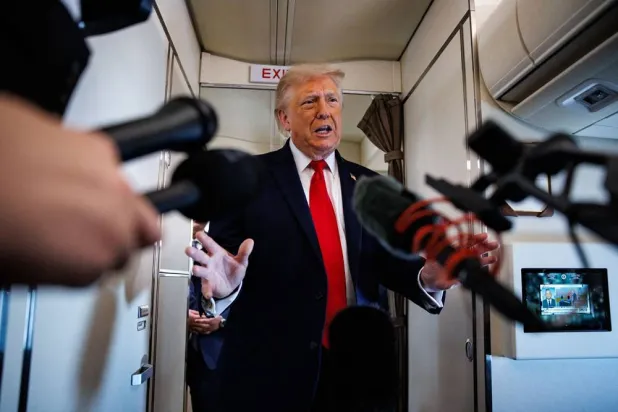 US President Donald Trump speaks with reporters while aboard Air Force One on June 5, 2026 en route to Chippewa Falls, Wisconsin. (Getty Images/AFP) 