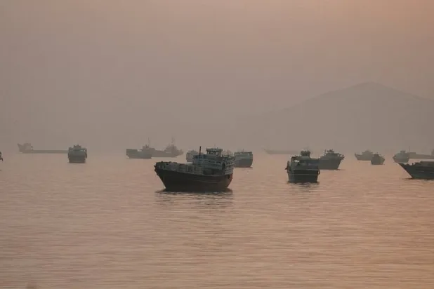 Vessels are anchored in the Strait of Hormuz as seen from Musandam, Oman, June 3, 2026. (Reuters)