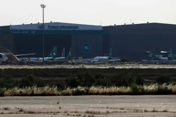 A picture shows Iraq Airlines planes parked at the Baghdad International Airport on April 24, 2024 - AFP