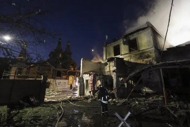 Ukrainian rescuers work at the site of a Russian strike on a residential area in Kharkiv, Ukraine, 09 June 2026, amid the ongoing Russian invasion. (EPA)