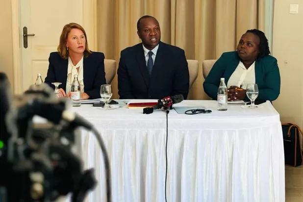  Lawyers Antonio Mulvay, left, and Willis Otieno, center, who are part of the legal team filing a law suit against Sudan's Rapid Support Forces (RSF) on behalf of Sudanese torture victims, speak to the media in Nairobi, Tuesday June 9, 2026. (AP) 