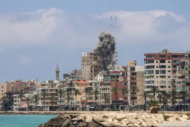 Smoke rises following an Israeli airstrike in the southern city of Tyre on June 9, 2026. (AFP)