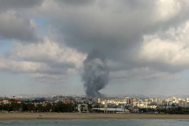 Smoke rises from the site of an Israeli airstrike that targeted a neighborhood in the southern Lebanese coastal city of Tyre on June 7, 2026. (AFP)